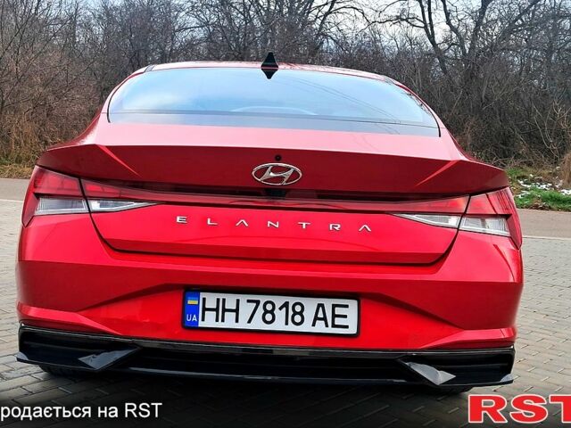 Красный Хендай Элантра, объемом двигателя 2 л и пробегом 77 тыс. км за 19300 $, фото 5 на Automoto.ua