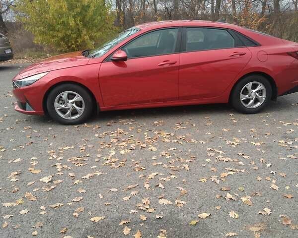 Красный Хендай Элантра, объемом двигателя 2 л и пробегом 58 тыс. км за 16200 $, фото 6 на Automoto.ua