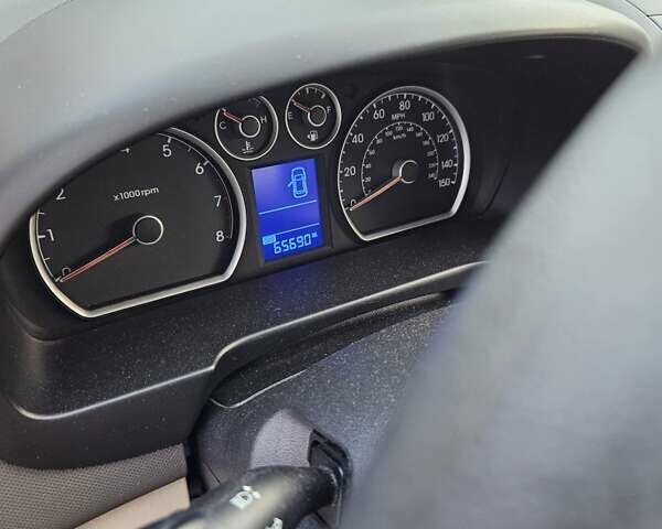 Червоний Хендай Елантра, об'ємом двигуна 2 л та пробігом 105 тис. км за 6999 $, фото 6 на Automoto.ua