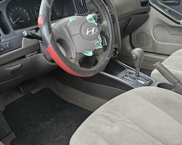 Желтый Хендай Элантра, объемом двигателя 1.99 л и пробегом 200 тыс. км за 1400 $, фото 12 на Automoto.ua