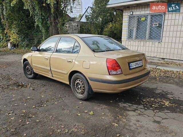 Желтый Хендай Элантра, объемом двигателя 1.99 л и пробегом 200 тыс. км за 1400 $, фото 5 на Automoto.ua