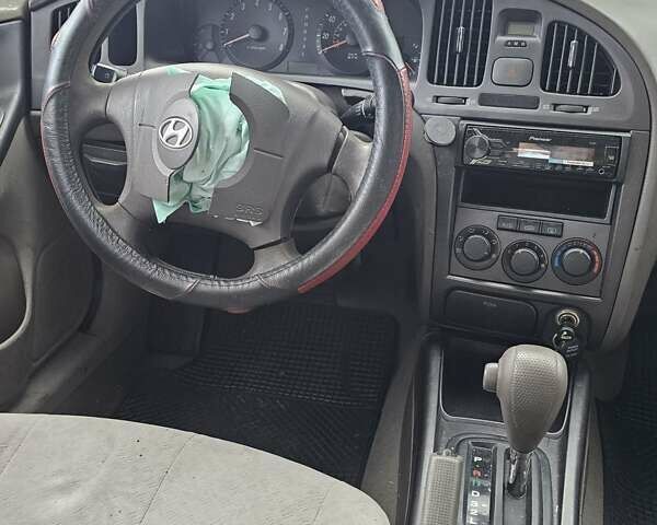 Желтый Хендай Элантра, объемом двигателя 1.99 л и пробегом 200 тыс. км за 1400 $, фото 13 на Automoto.ua