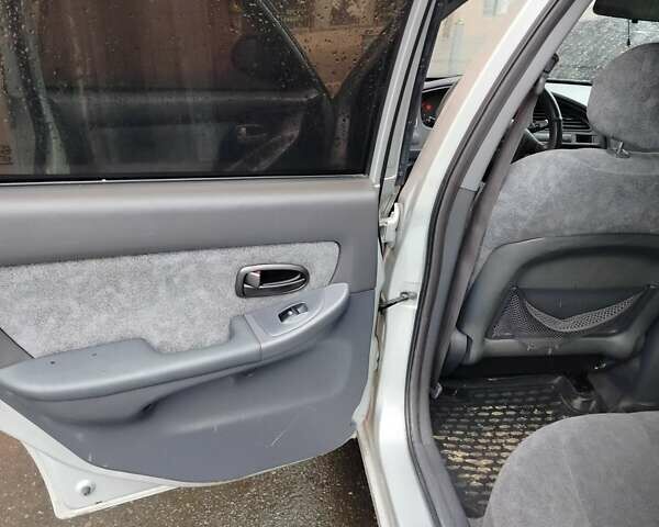 Серый Хендай Элантра, объемом двигателя 2 л и пробегом 167 тыс. км за 3200 $, фото 17 на Automoto.ua