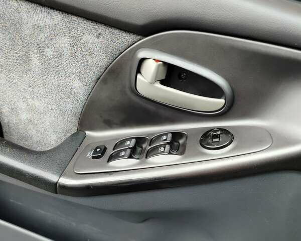 Серый Хендай Элантра, объемом двигателя 2 л и пробегом 167 тыс. км за 3200 $, фото 13 на Automoto.ua