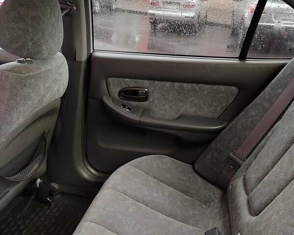 Серый Хендай Элантра, объемом двигателя 2 л и пробегом 167 тыс. км за 3200 $, фото 15 на Automoto.ua