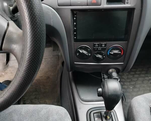 Серый Хендай Элантра, объемом двигателя 2 л и пробегом 167 тыс. км за 3200 $, фото 11 на Automoto.ua
