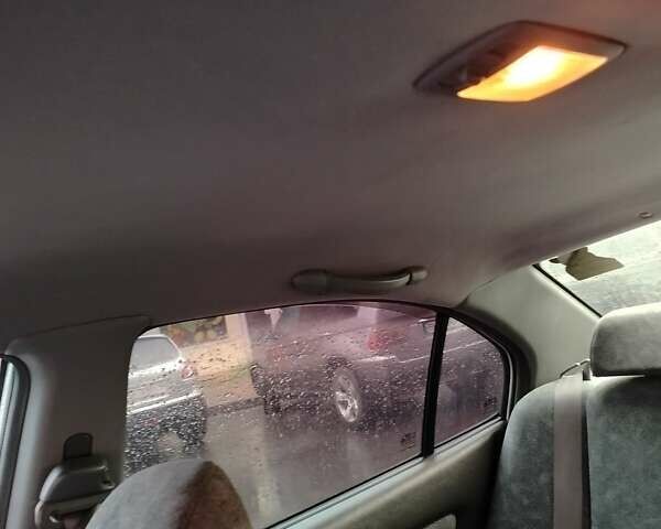 Серый Хендай Элантра, объемом двигателя 2 л и пробегом 167 тыс. км за 3200 $, фото 14 на Automoto.ua