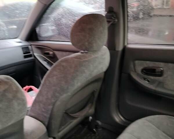 Серый Хендай Элантра, объемом двигателя 2 л и пробегом 167 тыс. км за 3200 $, фото 16 на Automoto.ua