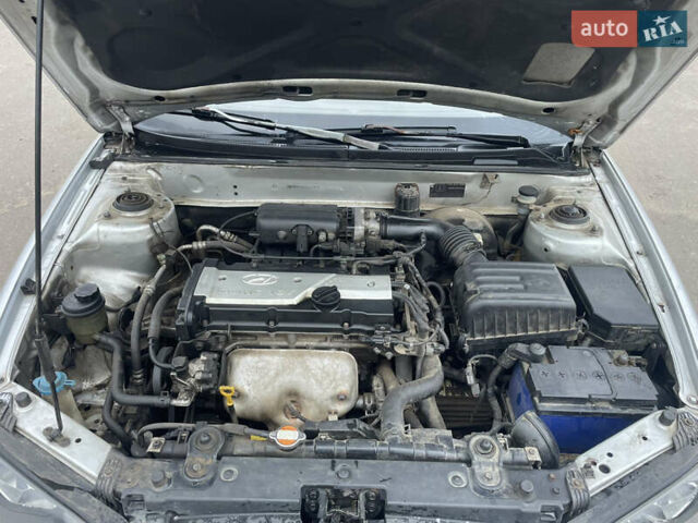 Серый Хендай Элантра, объемом двигателя 1.6 л и пробегом 249 тыс. км за 3400 $, фото 9 на Automoto.ua