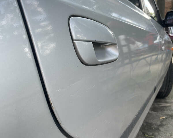 Серый Хендай Элантра, объемом двигателя 1.98 л и пробегом 218 тыс. км за 3750 $, фото 5 на Automoto.ua