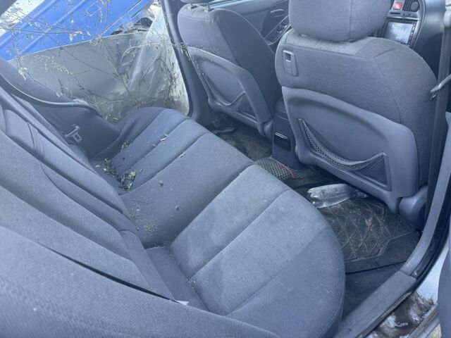 Серый Хендай Элантра, объемом двигателя 1.6 л и пробегом 200 тыс. км за 900 $, фото 6 на Automoto.ua