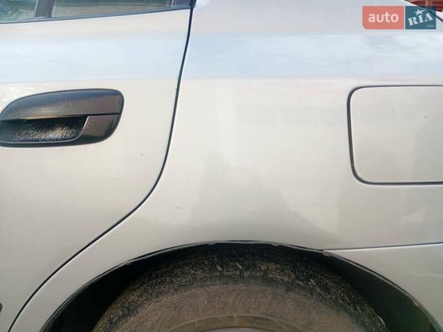 Серый Хендай Элантра, объемом двигателя 1.6 л и пробегом 221 тыс. км за 4100 $, фото 1 на Automoto.ua