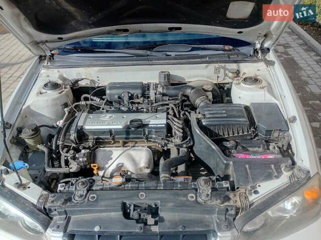 Серый Хендай Элантра, объемом двигателя 1.6 л и пробегом 221 тыс. км за 4100 $, фото 11 на Automoto.ua