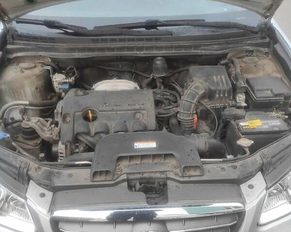 Сірий Хендай Елантра, об'ємом двигуна 1.59 л та пробігом 90 тис. км за 6880 $, фото 6 на Automoto.ua