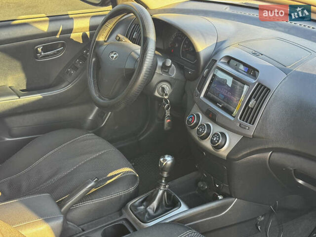 Хендай Элантра 2010 в Сумах на Automoto.ua Серый Хендай Элантра, объемом двигателя 1.59 л и пробегом 280 тыс. км за 6500 $, фото 27 на Automoto.ua