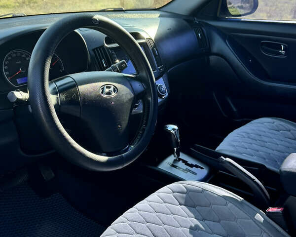 Серый Хендай Элантра, объемом двигателя 1.59 л и пробегом 247 тыс. км за 8600 $, фото 4 на Automoto.ua