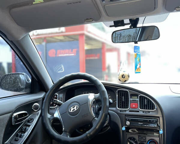 Сірий Хендай Елантра, об'ємом двигуна 1.6 л та пробігом 220 тис. км за 4550 $, фото 12 на Automoto.ua