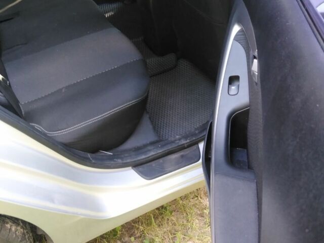 Серый Хендай Элантра, объемом двигателя 1.6 л и пробегом 197 тыс. км за 8500 $, фото 6 на Automoto.ua