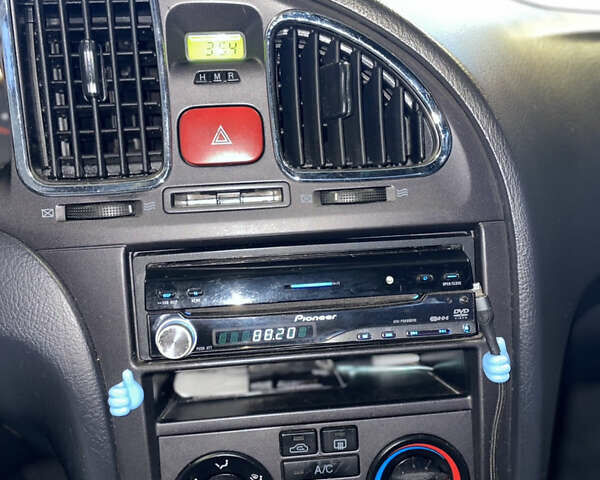 Сірий Хендай Елантра, об'ємом двигуна 1.6 л та пробігом 220 тис. км за 4550 $, фото 5 на Automoto.ua