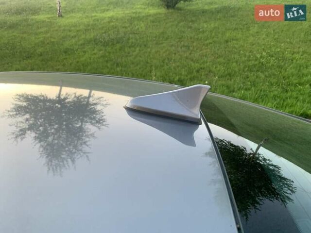 Сірий Хендай Елантра, об'ємом двигуна 2 л та пробігом 169 тис. км за 11700 $, фото 11 на Automoto.ua