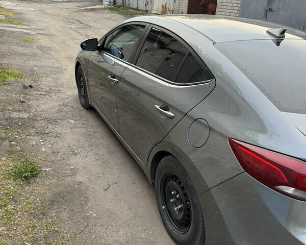 Серый Хендай Элантра, объемом двигателя 2 л и пробегом 87 тыс. км за 12800 $, фото 6 на Automoto.ua