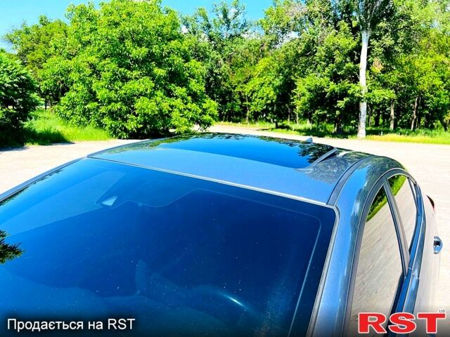 Сірий Хендай Елантра, об'ємом двигуна 2 л та пробігом 106 тис. км за 11999 $, фото 5 на Automoto.ua