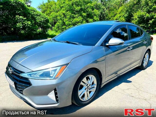 Сірий Хендай Елантра, об'ємом двигуна 2 л та пробігом 106 тис. км за 11999 $, фото 1 на Automoto.ua