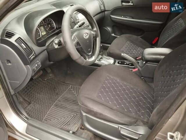 Сірий Хендай Елантра, об'ємом двигуна 2 л та пробігом 246 тис. км за 5800 $, фото 9 на Automoto.ua