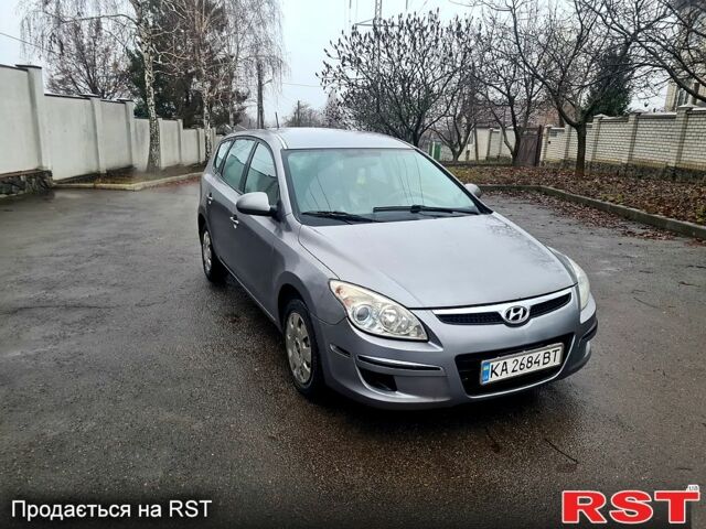 Сірий Хендай Елантра, об'ємом двигуна 2 л та пробігом 250 тис. км за 4750 $, фото 1 на Automoto.ua