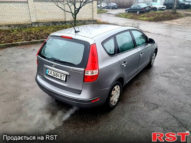 Сірий Хендай Елантра, об'ємом двигуна 2 л та пробігом 250 тис. км за 4750 $, фото 5 на Automoto.ua