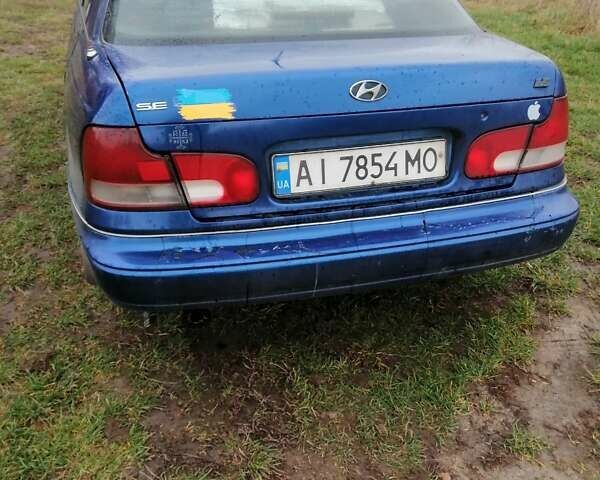 Синій Хендай Елантра, об'ємом двигуна 1.5 л та пробігом 455 тис. км за 750 $, фото 2 на Automoto.ua