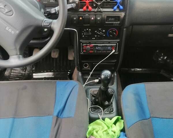 Синій Хендай Елантра, об'ємом двигуна 1.5 л та пробігом 455 тис. км за 750 $, фото 8 на Automoto.ua