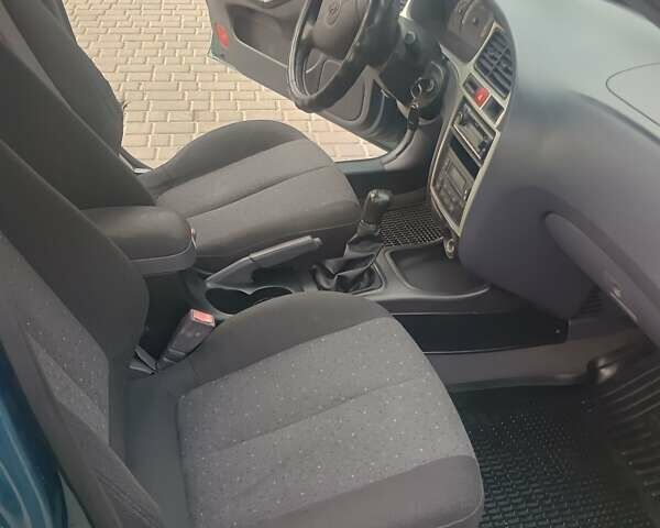 Синий Хендай Элантра, объемом двигателя 1.6 л и пробегом 320 тыс. км за 2800 $, фото 6 на Automoto.ua