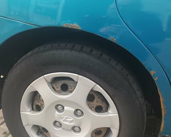 Синий Хендай Элантра, объемом двигателя 1.6 л и пробегом 320 тыс. км за 2800 $, фото 11 на Automoto.ua