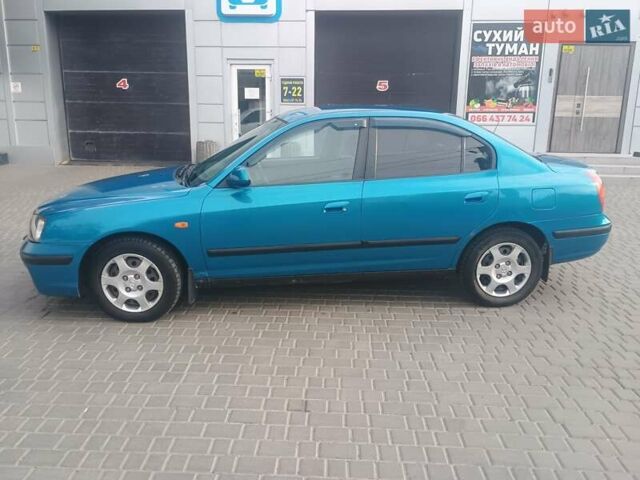 Синий Хендай Элантра, объемом двигателя 1.6 л и пробегом 320 тыс. км за 2800 $, фото 4 на Automoto.ua