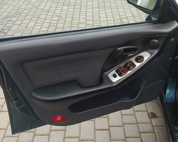 Синий Хендай Элантра, объемом двигателя 1.6 л и пробегом 320 тыс. км за 2800 $, фото 8 на Automoto.ua