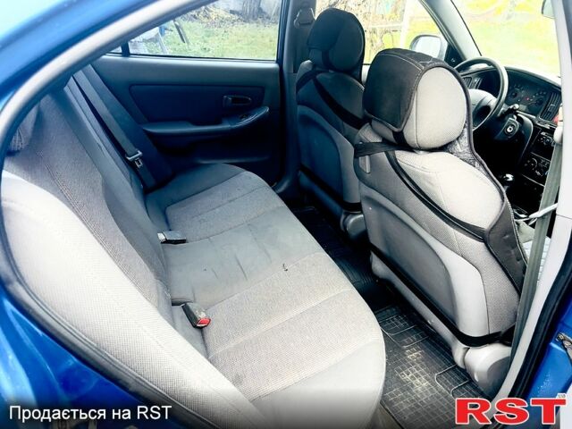 Синій Хендай Елантра, об'ємом двигуна 1.6 л та пробігом 200 тис. км за 3250 $, фото 5 на Automoto.ua