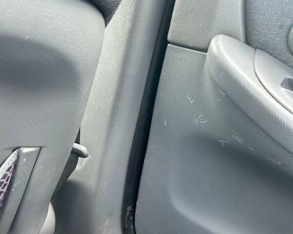 Синий Хендай Элантра, объемом двигателя 2 л и пробегом 320 тыс. км за 4000 $, фото 10 на Automoto.ua