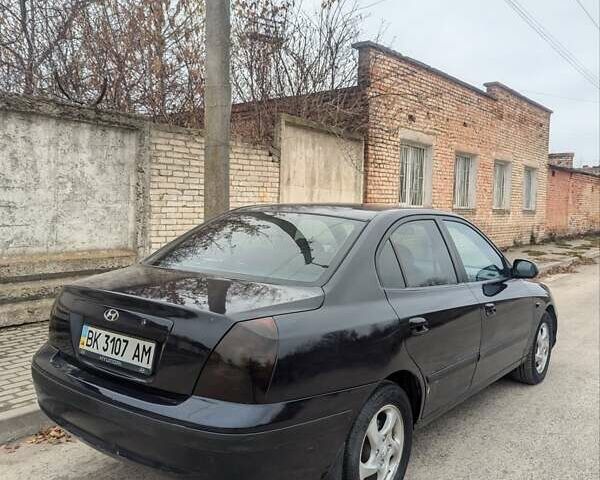 Синій Хендай Елантра, об'ємом двигуна 1.98 л та пробігом 244 тис. км за 2800 $, фото 3 на Automoto.ua