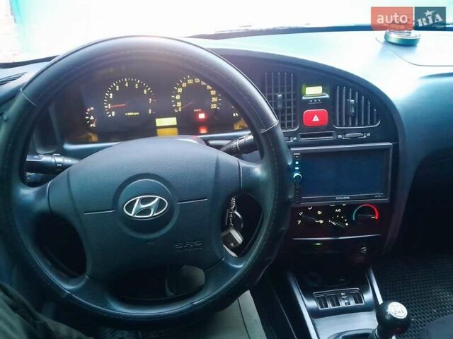 Синий Хендай Элантра, объемом двигателя 1.6 л и пробегом 200 тыс. км за 3700 $, фото 10 на Automoto.ua