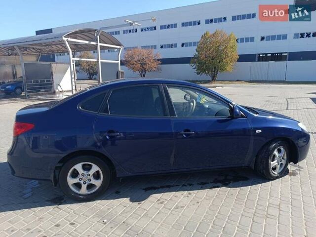 Синий Хендай Элантра, объемом двигателя 2 л и пробегом 267 тыс. км за 5900 $, фото 6 на Automoto.ua