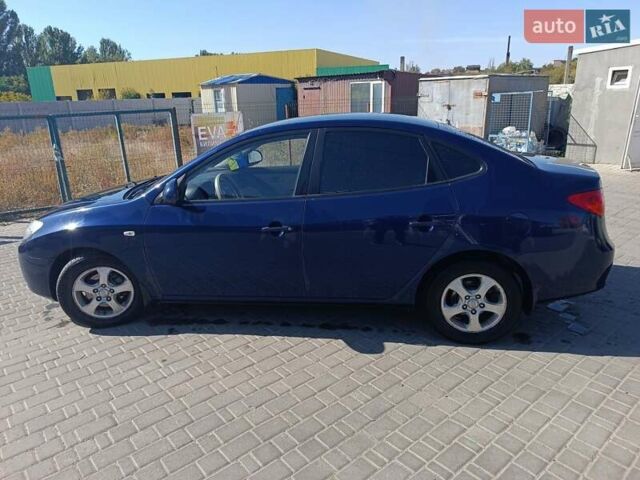 Синий Хендай Элантра, объемом двигателя 2 л и пробегом 267 тыс. км за 5900 $, фото 8 на Automoto.ua