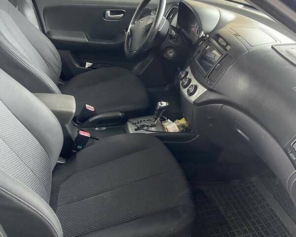 Синий Хендай Элантра, объемом двигателя 1.59 л и пробегом 273 тыс. км за 5300 $, фото 4 на Automoto.ua