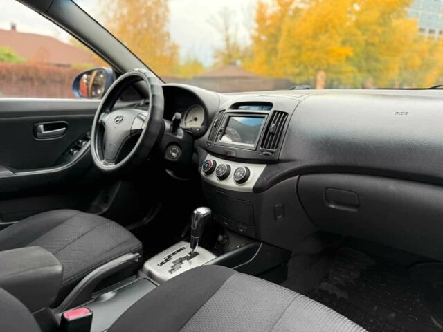 Синий Хендай Элантра, объемом двигателя 2 л и пробегом 284 тыс. км за 5499 $, фото 4 на Automoto.ua