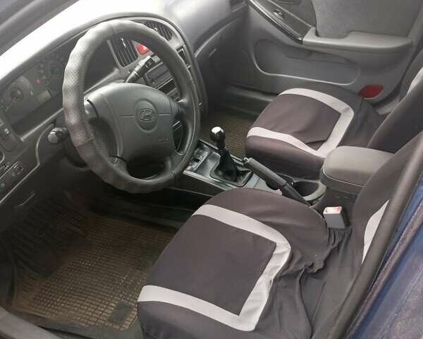 Синий Хендай Элантра, объемом двигателя 1.6 л и пробегом 175 тыс. км за 3500 $, фото 12 на Automoto.ua