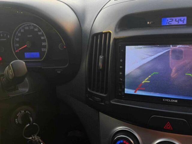 Синий Хендай Элантра, объемом двигателя 1.6 л и пробегом 133 тыс. км за 6250 $, фото 5 на Automoto.ua