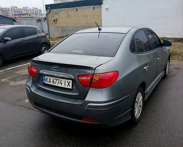Синий Хендай Элантра, объемом двигателя 1.6 л и пробегом 327 тыс. км за 6300 $, фото 3 на Automoto.ua
