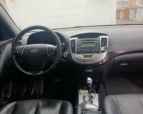 Синий Хендай Элантра, объемом двигателя 1.6 л и пробегом 327 тыс. км за 6300 $, фото 7 на Automoto.ua