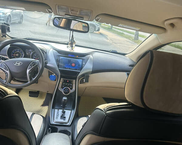 Хендай Элантра 2012 в Хмельницком на Automoto.ua Синий Хендай Элантра, объемом двигателя 1.8 л и пробегом 211 тыс. км за 8999 $, фото 7 на Automoto.ua