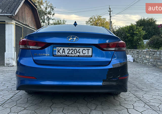 Синий Хендай Элантра, объемом двигателя 2 л и пробегом 135 тыс. км за 9900 $, фото 5 на Automoto.ua